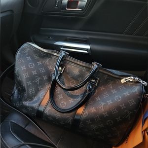 Louis Vuitton black duffle bag